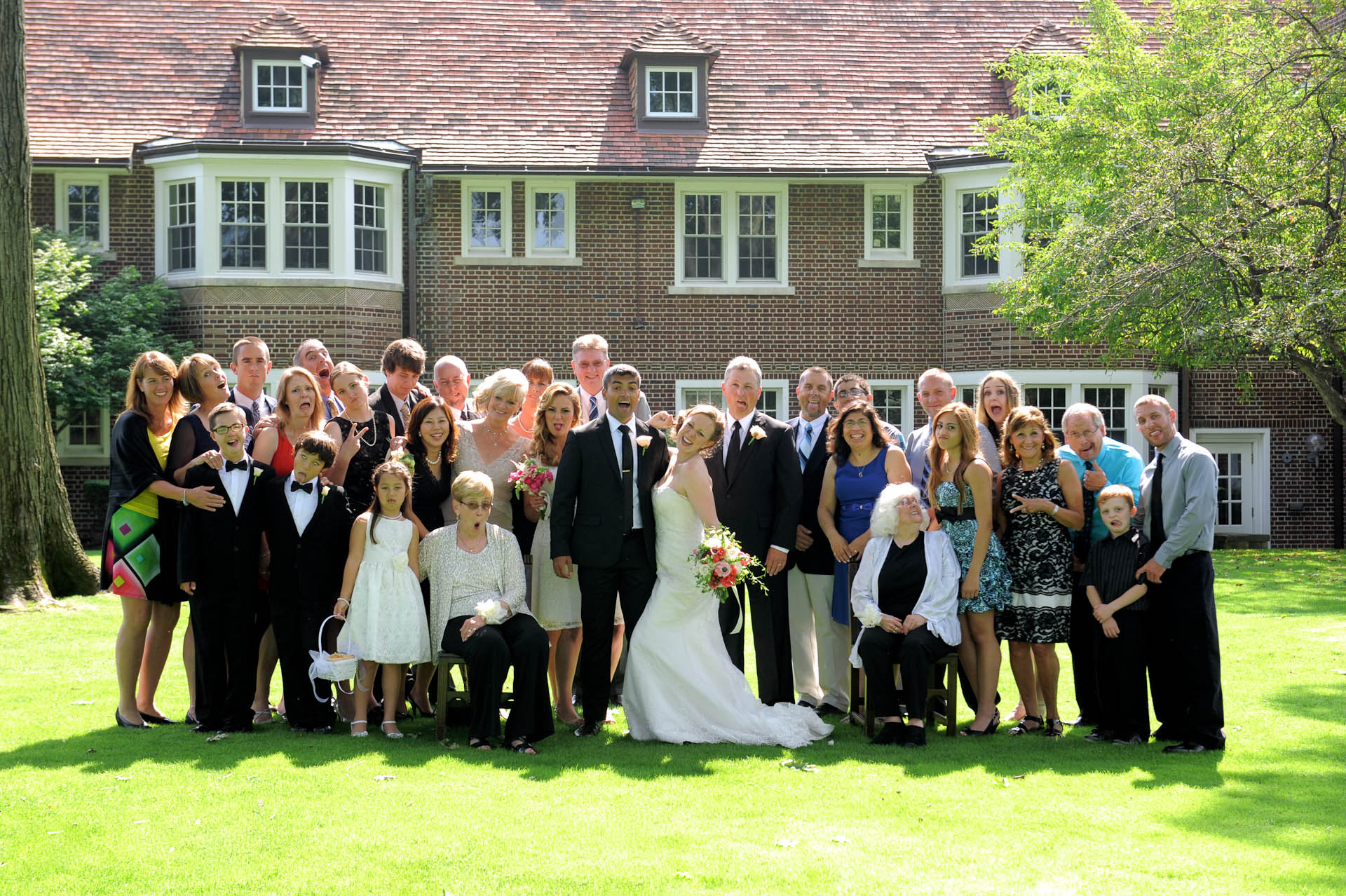 Detroit Golf Club wedding photographer's photo of the bride and groom's family letting off steam at the Detroit Golf Club.